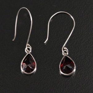 14K garnet tear drop earrings.